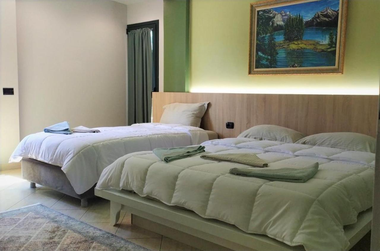 Luander Hotel Tirana Quarto foto