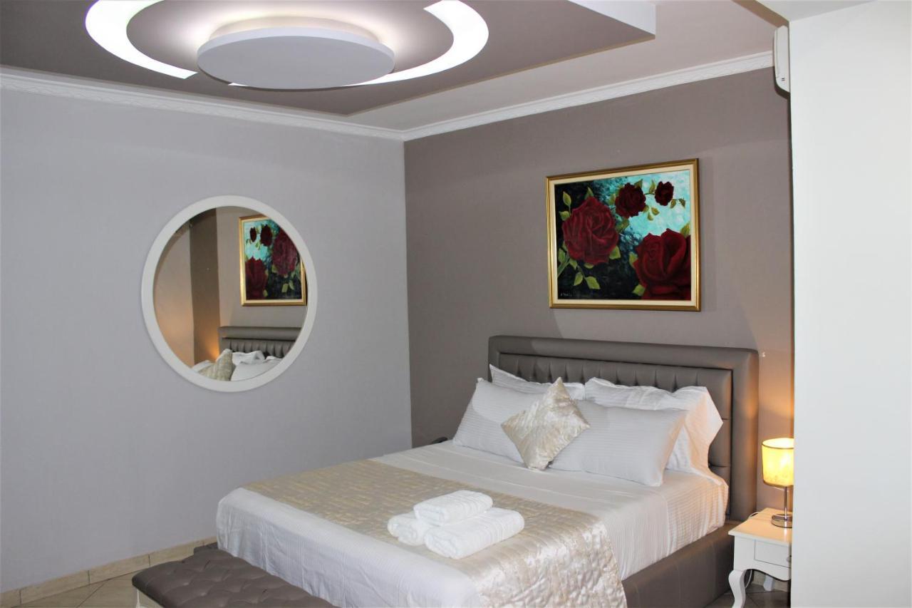 Luander Hotel Tirana Quarto foto